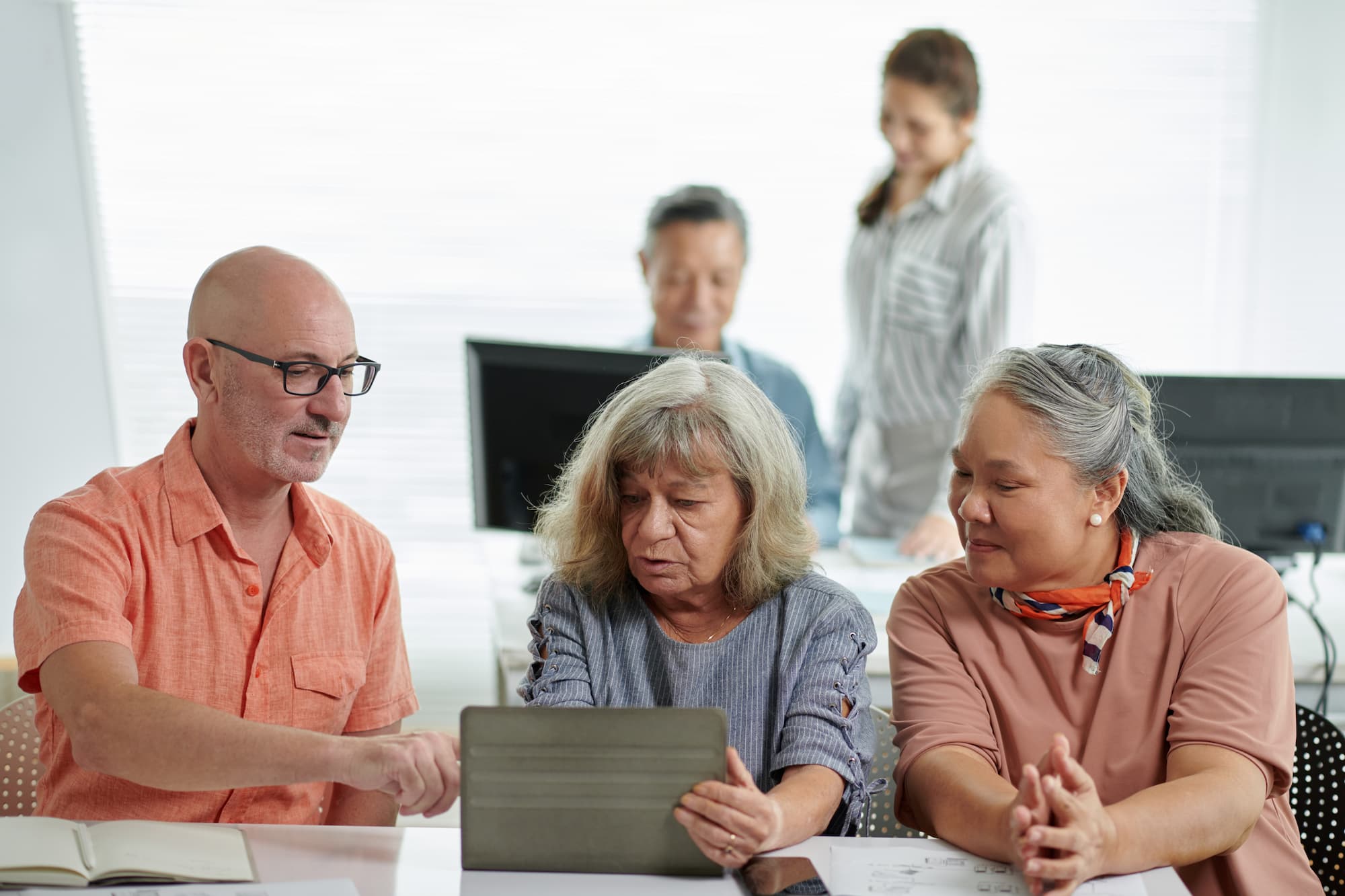 People learning together with a laptop